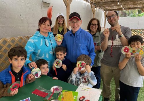 Rabbi Ira with Youth Succah Decorating