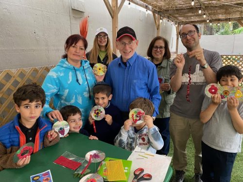 Rabbi Ira with Youth Succah Decorating